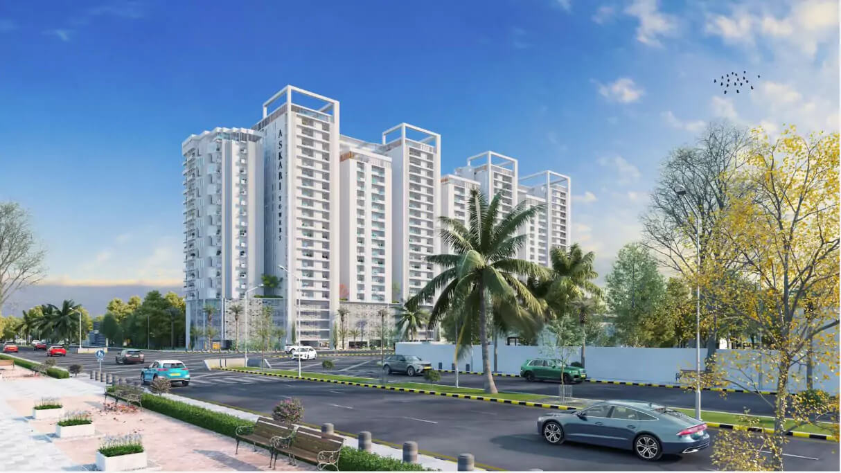 Askari Towers Karachi Luxury 3 and 4 Bedrooms Apartments For Sale in Karachi Cantt Modern high-rise white towers of Askari Towers Karachi in Cantt, with palm trees, landscaped road and vehicles