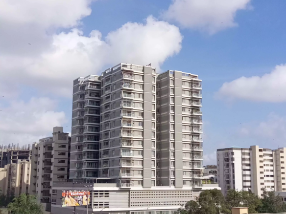 Dany Icon Luxury High-Rise Towers In Civil Lines, Modern Grey Multi-Story Building With Balconies Amid Urban Surroundings