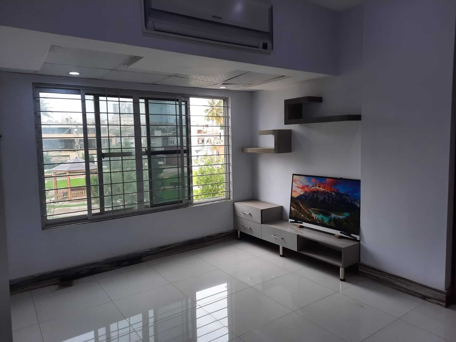 Dunes Marvel 3-Bedroom Apartment for Sale in Clifton Block 5 Karachi (7) Spacious room in Dunes Marvel 3-bedroom apartment Clifton Block 5 Karachi with large window air conditioning and TV console