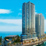 H&Amp;S Residence In Dha Phase 8: Modern High-Rise Towers With Glass Facades Overlooking Sea, Palm-Lined Promenade And Waterfront