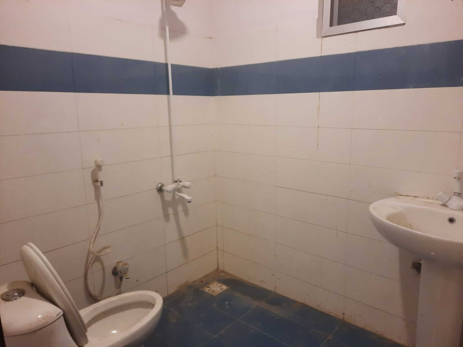 Dunes Marvel Clifton 3-Bedroom Flat for Sale in Clifton Block 5 Karachi (5) Bathroom with toilet, sink and shower in Dunes Marvel Clifton flat, Clifton Block 5 Karachi