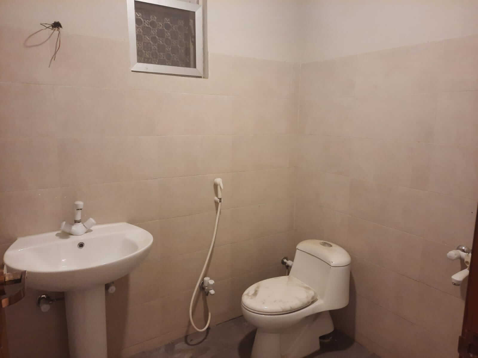 Dunes Marvel Clifton 3-Bedroom Flat for Sale in Clifton Block 5 Karachi (6) Bathroom with sink and toilet in Dunes Marvel Clifton apartment, Clifton Block 5 Karachi