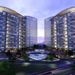 Twin High-Rise Towers With Curved Roofs At The Arkadians, Dha Phase 8 Karachi, Central Pool, Palm Trees, And Landscaped Groun