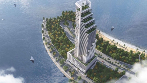 Aerial View Of Metro Seafront High-Rise Tower At Dha Phase 8 Karachi With Tiered Green Terraces Waterfront Promenade Beach An