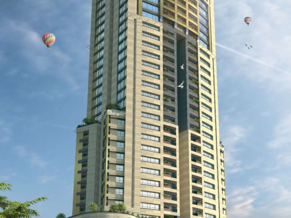 Grand Monarch Seaside Residency High-Rise Tower With Curved Beige Facade, Glass Balconies, Palm Trees, And Entrance Signage