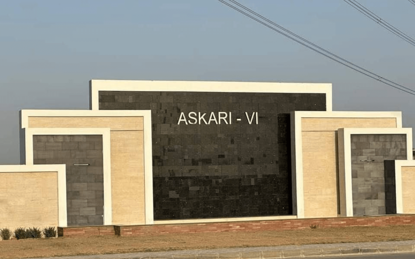 Grand 'ASKARI-VI' entrance signboard in Askari 6 Karachi with modern beige and dark stone panels