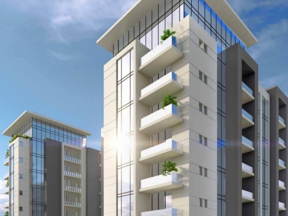 Modern High-Rise Facades Of Falaknaz K-I Towers Clifton With Glass Panels, White Exteriors, Planted Balconies, And Blue Sky