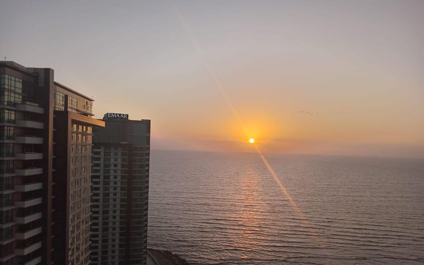 Sea-Facing Sunset View From 3-Bed Apartment In Emaar Pearl Tower 3 Dha Phase 8 Karachi, Modern Towers And Arabian Sea Waves