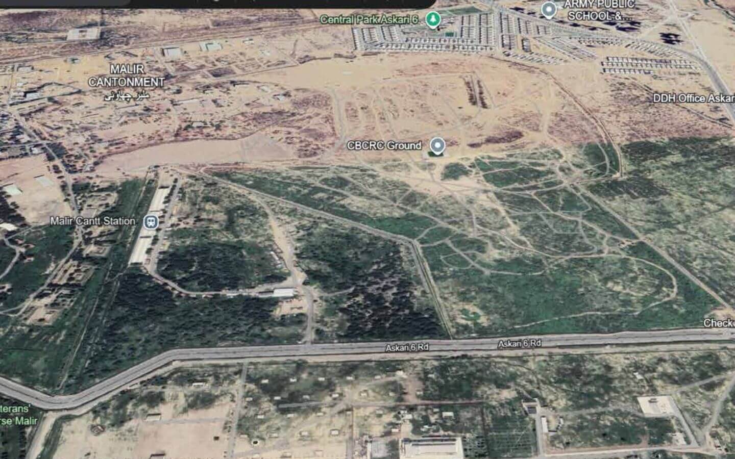 Askari Villas Karachi 270 Sq Yd Luxury by MaxX Capitals (6) Aerial view of Askari Villas at Askari VI Karachi showing residential buildings green spaces Garden Lake and highway