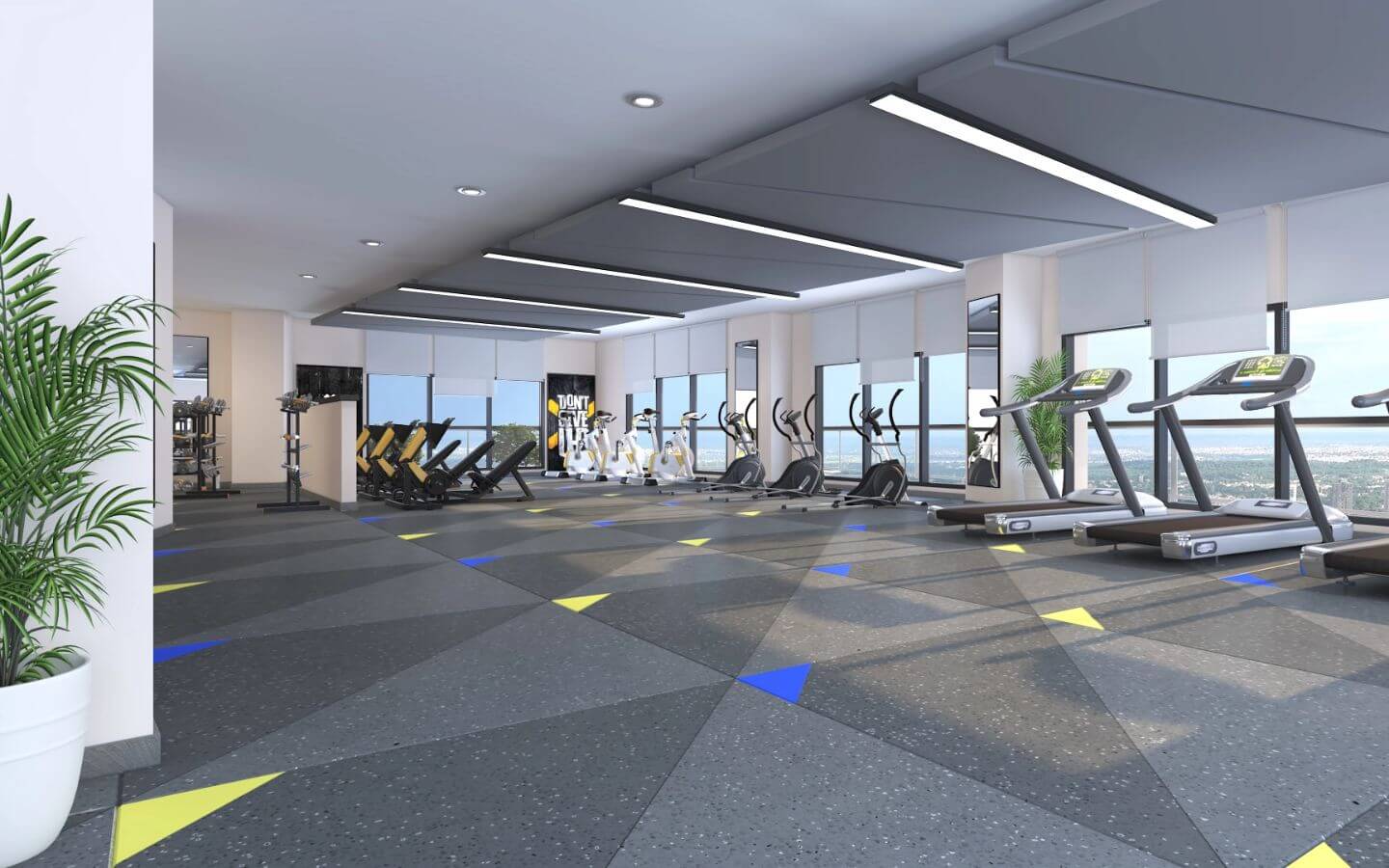 4-Bed Apartment for Sale at Grand Monarch Seaside Residency Clifton (9) Modern gym at Grand Monarch Seaside Residency Clifton with treadmills ellipticals and large windows overlooking the city