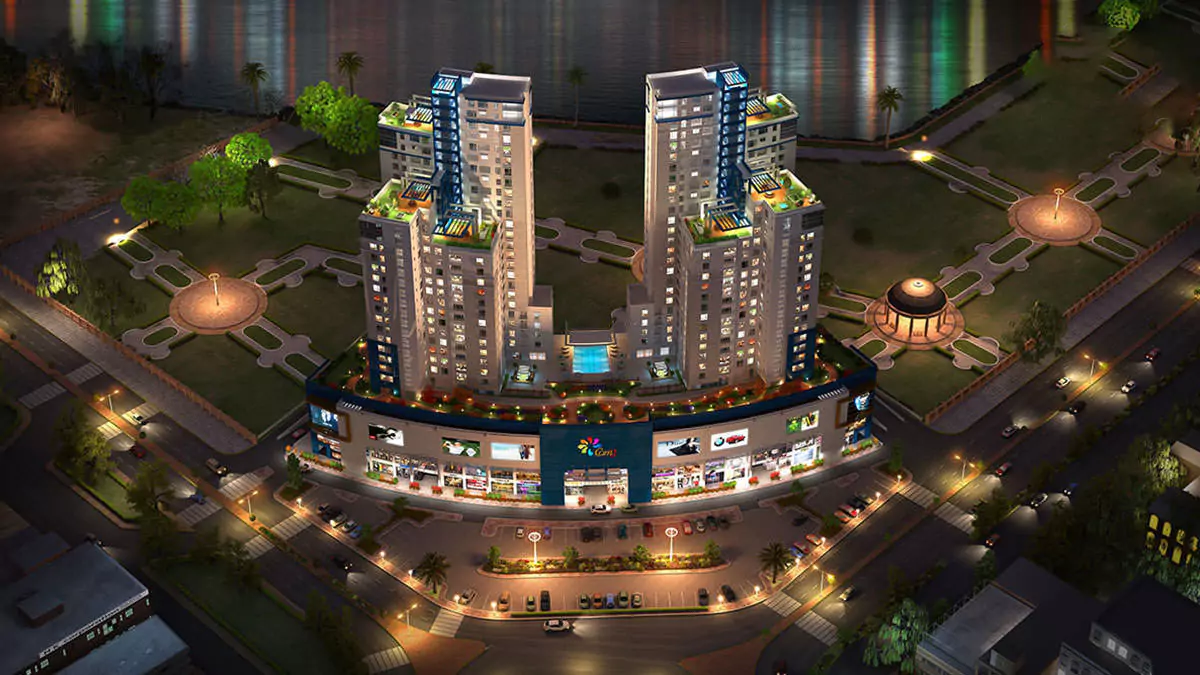 Luxury Living 4 Bedrooms Flat for Rent In COM3 Tower Clifton Block 6 Karachi (3) Night aerial view of COM3 Tower Clifton with twin high-rise towers, rooftop pool, gardens, palm trees, and retail podium