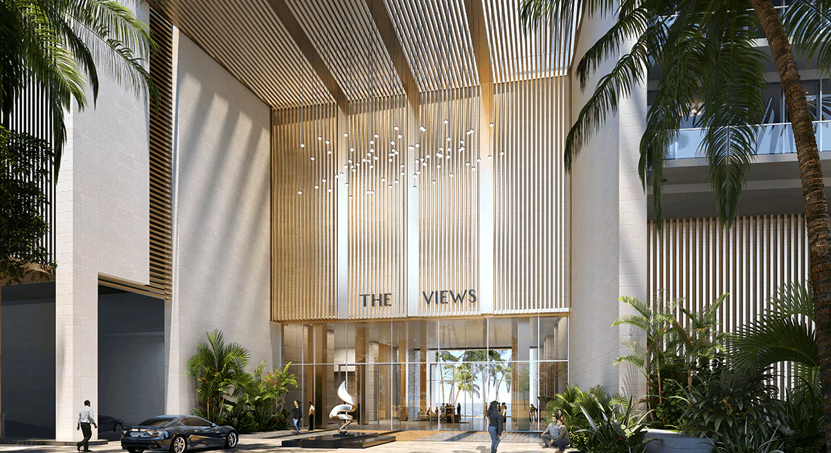 Emaar The Views Tower 2 Your Luxurious Waterfront Escape in DHA Karachi (4) Grand entrance of The Views By Emaar luxury waterfront apartments in Karachi with golden signage, palm trees, modern slatted