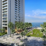 Tall Modern High-Rise Apartments At The Views By Emaar In Karachi, Waterfront With Sea Views, Palm Trees, Green Lawns, And Pe