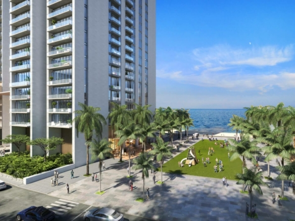Tall Modern High-Rise Apartments At The Views By Emaar In Karachi, Waterfront With Sea Views, Palm Trees, Green Lawns, And Pe