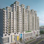 Burj Al Jinnah High-Rise Towers With White Facades, Landscaped Gardens, Roads, And Cityscape Views