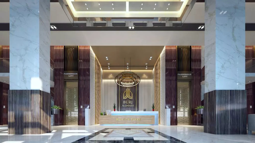 Burj Al Jinnah 3-Bedroom Flat For Sale with Private Garden at Main Jinnah Avenue Opposite Malr Cantt Karachi (6) Grand lobby of Burj Al Jinnah with marble columns, reception desk, elevators, and high ceilings