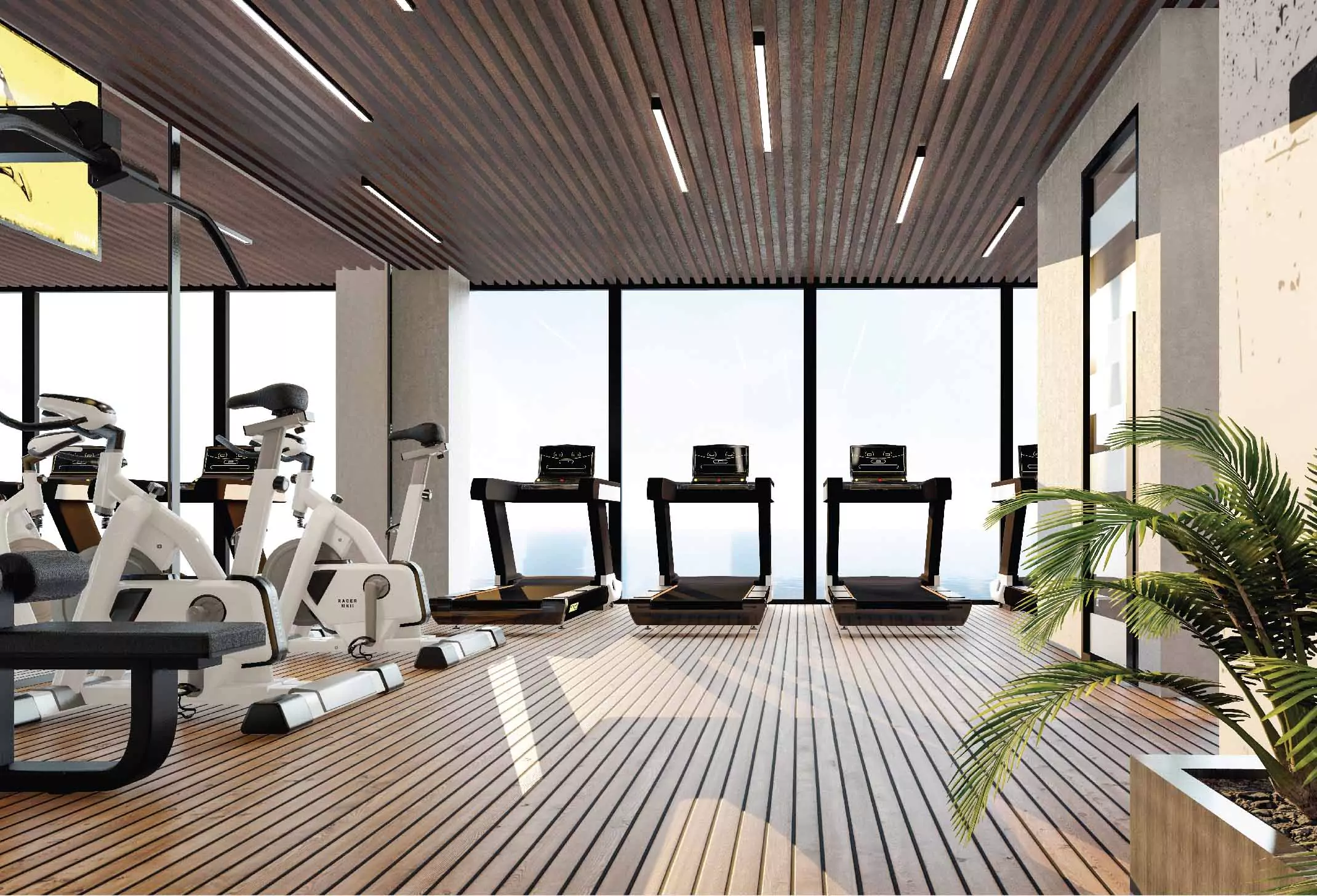 A&Z Tower Clifton Prime Sea-Facing Luxury Offices for Sale In Clifton Block 1, Clifton Karachi (3) Spacious gym in A&Z Tower Clifton with treadmills, exercise bikes, weight bench, sea-facing windows, wooden floors and ceilin