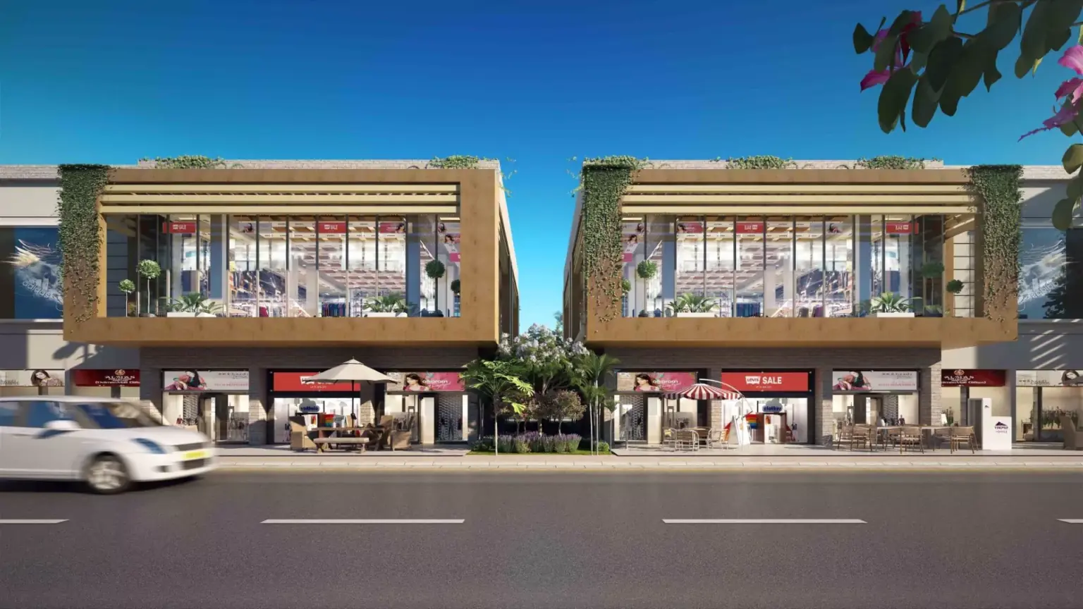 Titan Enclave: 120 Yd Residential Plot New Booking in Karachi – N-5 Highway Modern Titan Enclave buildings in Karachi with glass facades, vertical green walls, outdoor seating, umbrellas, palm trees, a