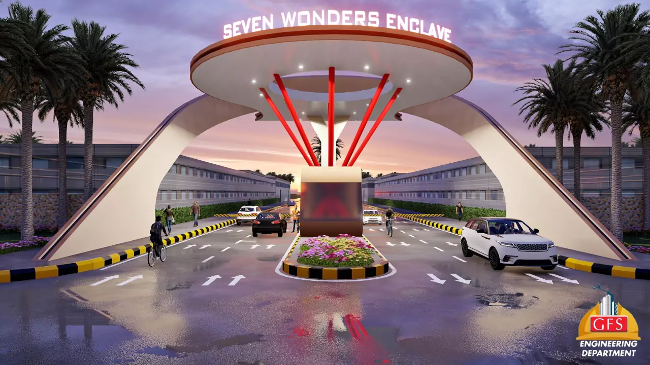Seven Wonders Enclave Prime 120 yd Plot for Sale in Karachi (2) Grand entrance gate of Seven Wonders Enclave in Karachi with modern archway, palm trees, cars, flower beds, and illuminated s