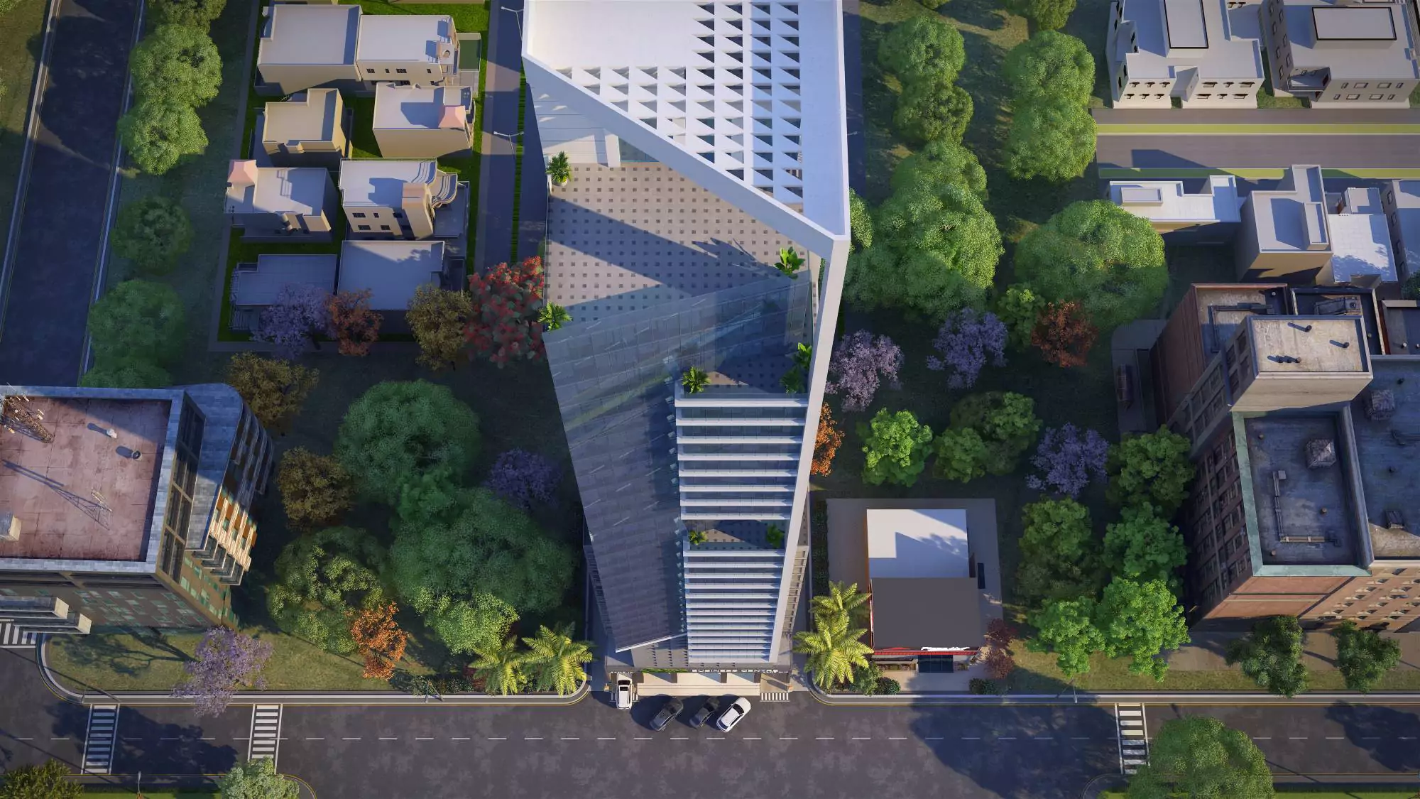 Saima Business Center Office Spaces for Sale in Clifton Block 7 Clifton Karachi (5) Aerial view of Saima Business Center modern office tower in Clifton with angular white facade and lush green surroundings