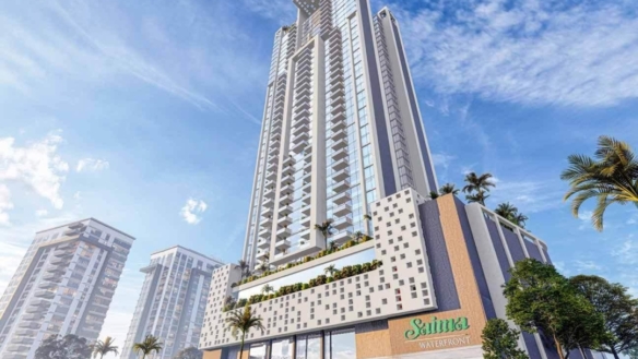 Salima Waterpark High-Rise Tower With Modern Glass Facade, Balconies, Palm Trees, And Adjacent Buildings Under Blue Sky