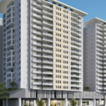 Roshan Tower Luxury Apartments In Pechs Karachi, Twin High-Rise Towers With Balconies, Glass Facades, And Landscaped Entrance