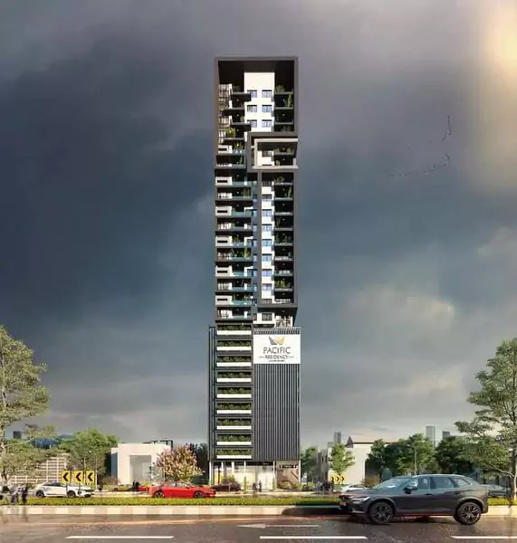 Pacific Residency Clifton Luxury 3-Bedroom Apartments For Sale In Block 7 Clifton Karachi Exclusive Community (5) Pacific Residency Clifton high-rise tower with sleek black and white facade, green balconies, prominent signage, trees, and p