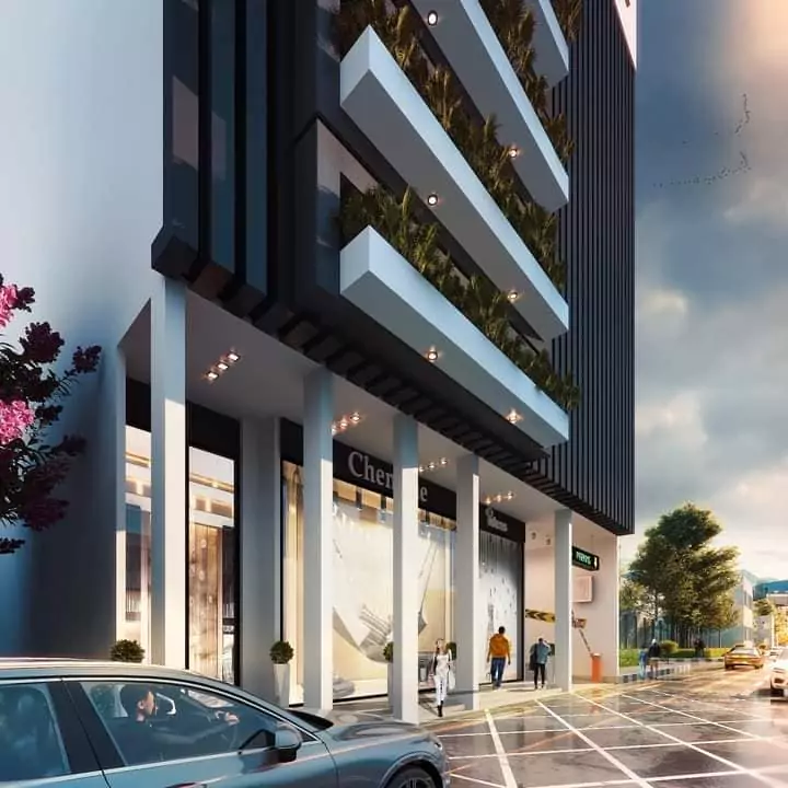 Pacific Residency Clifton Luxury 3-Bedroom Apartments For Sale In Block 7 Clifton Karachi Exclusive Community (6) Modern facade of Pacific Residency Clifton with vertical gardens, black accents, glass retail spaces and street view