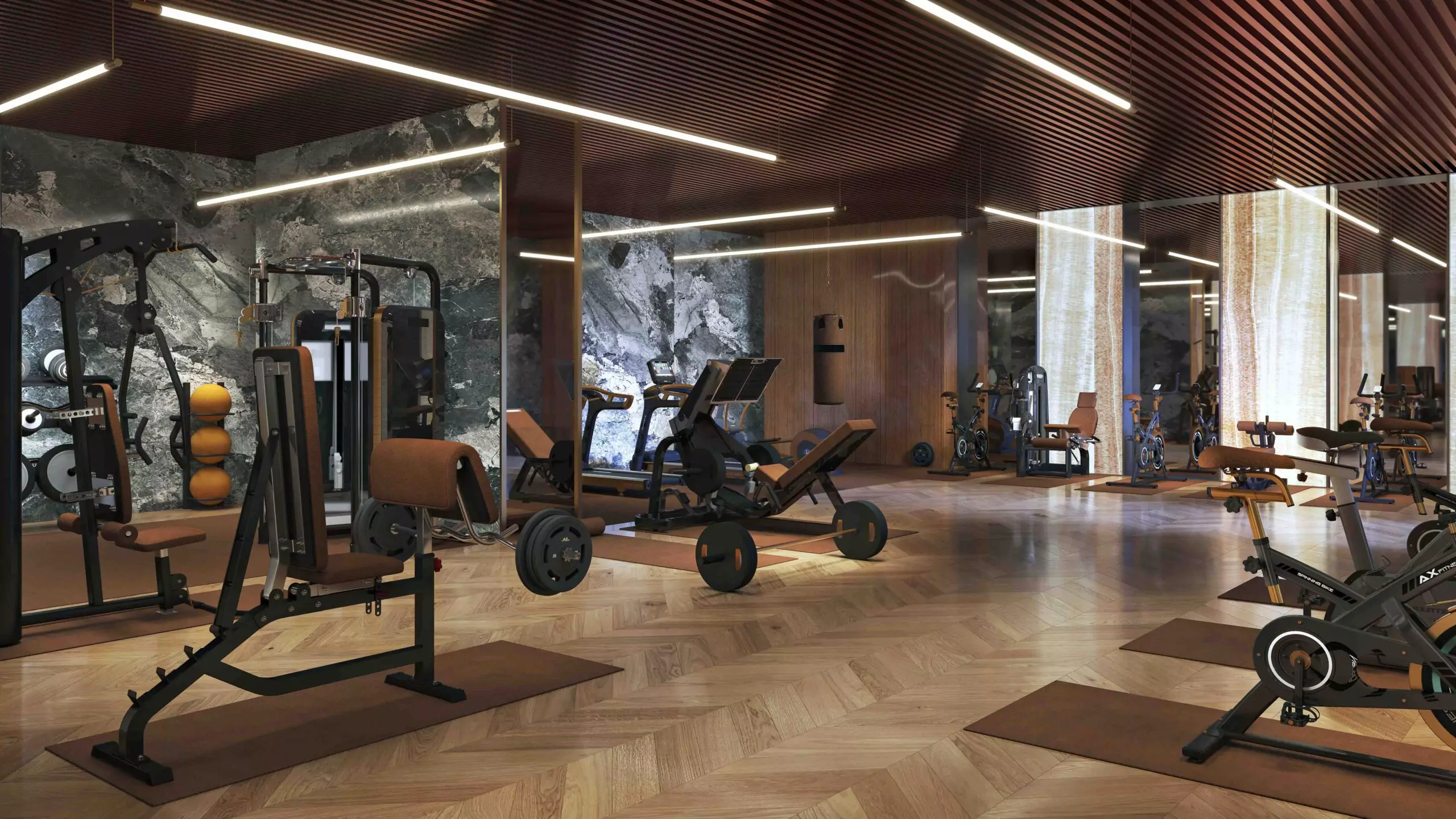 AA Waterfront Apartments Luxury Flats & Penthouse For Sale In DHA Phase 8 Karachi (5) Modern gym interior at AA Waterfront Apartments with weight machines, exercise bikes, benches, mirrors, and wooden flooring