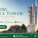Luxury High-Rise Country Finance Tower With Glass Facade, Surrounded By Lush Greenery In Clifton, Karachi.