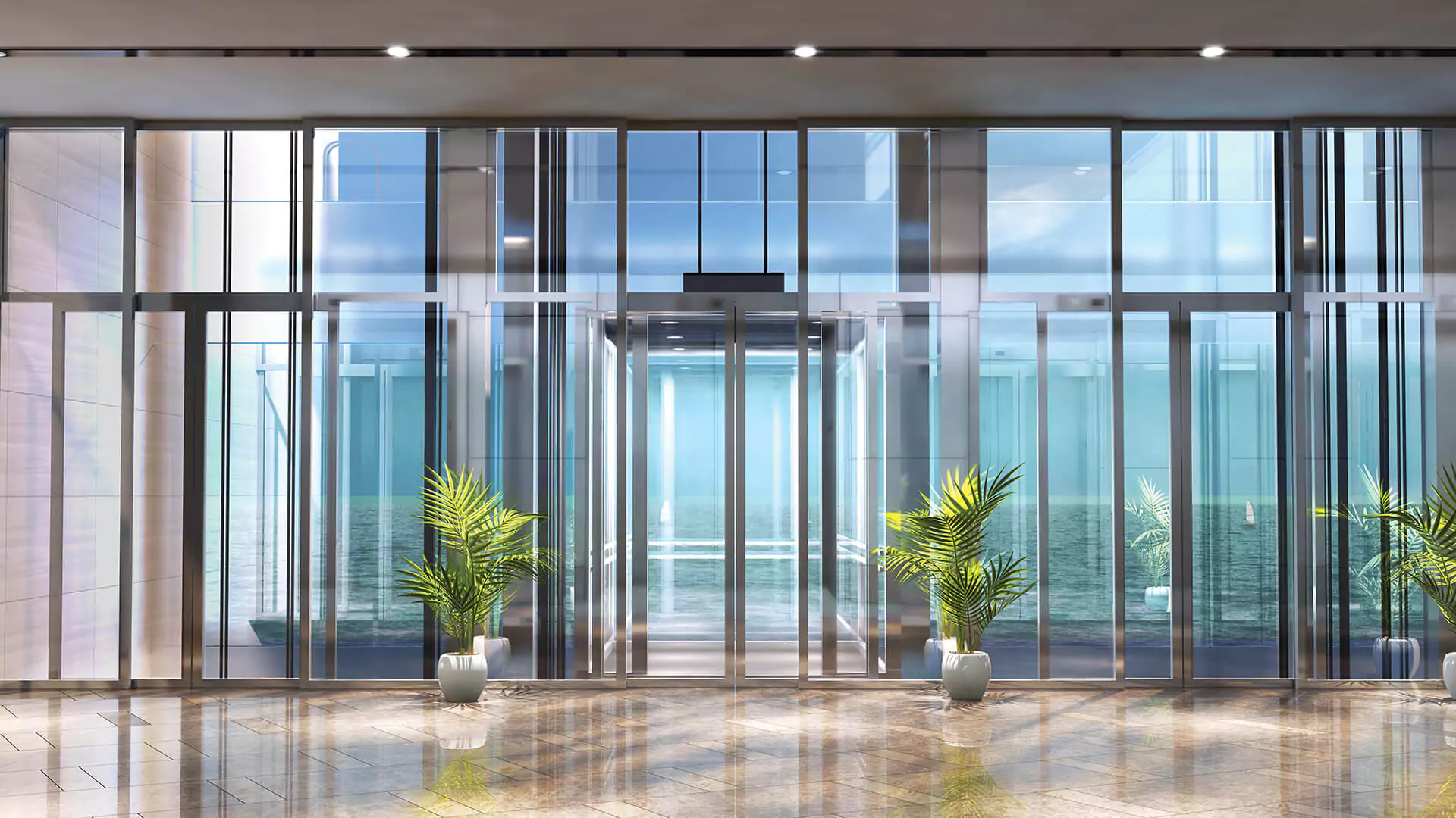 Lift Space Country Finance Tower Luxury Offices For Sale in Clifton Block 4 Karachi Grand glass entrance lobby of Country Finance Tower in Clifton with revolving doors, potted palms, and marble flooring