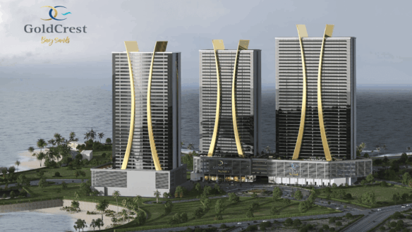 Three Curved High-Rise Towers Of Goldcrest Bay Sands With Gold Accents On Waterfront Overlooking Sea And Beach