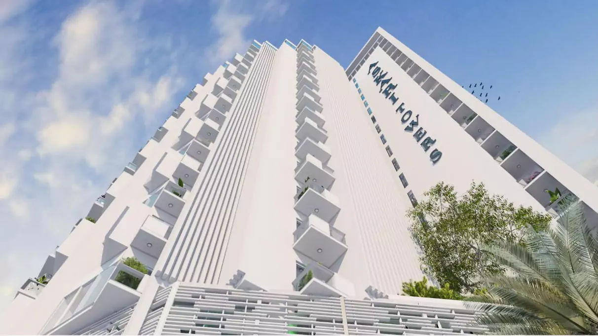 Askari Towers Karachi 3-4 Bedrooms Luxury Apartments For Sale in Cantt Near Jinnah Hosital (4) Askari Towers Karachi high-rise in Cantt with white facade, balconies, plants, palm trees, and blue sky