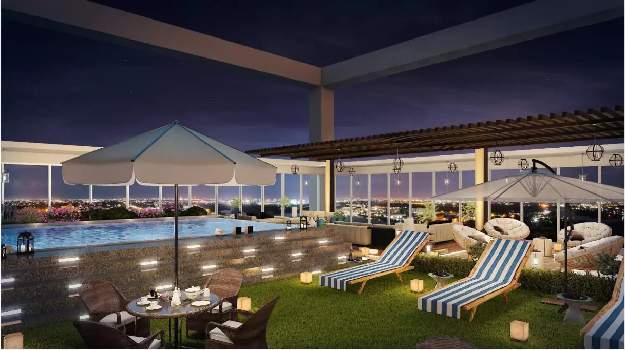 Askari Towers Karachi 3-4 Bedrooms Luxury Apartments For Sale in Cantt Near Jinnah Hosital (8) Rooftop infinity pool with blue striped loungers, white umbrellas, wicker seating and city skyline views at Askari Towers Kar