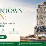 High-Rise Luxury Residential Tower In Pechs With Modern Facade, Illuminated Balconies, And Contemporary Architecture.