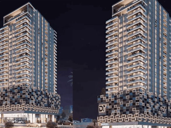 Night View Of Downtown Icon Luxury Apartments In Pechs, Twin High-Rise Towers With Glass Facades, Balconies, Mosaic-Patterned