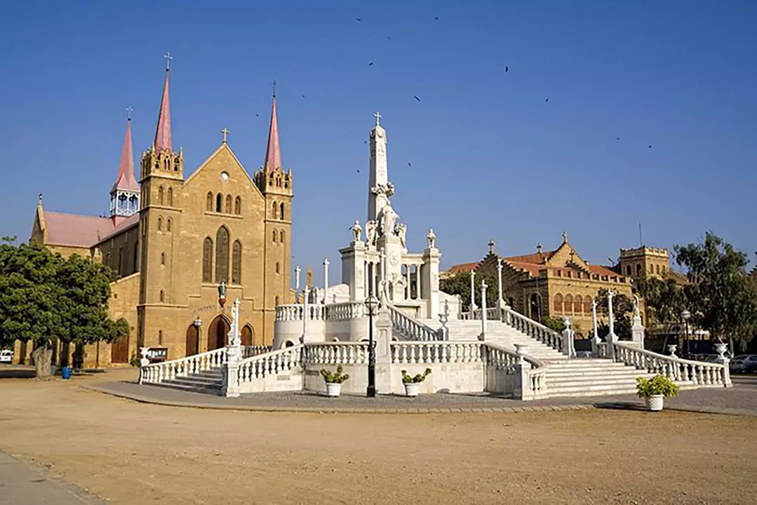 Luxurious 3-Bedroom Flat For Rent in Bath Island Karachi (3) St. Patrick's Cathedral with pink roof and spires beside ornate white fountain in Bath Island Karachi near 3-bedroom flat for