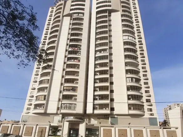 Modern High-Rise Apartment Building Gulistan Jamal In Civil Lines Karachi With Curved Towers Balconies And Gated Entrance