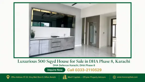 Modern kitchen interior with marble countertops and backsplash, sleek cabinetry, and a built-in elevator in a luxury house fo