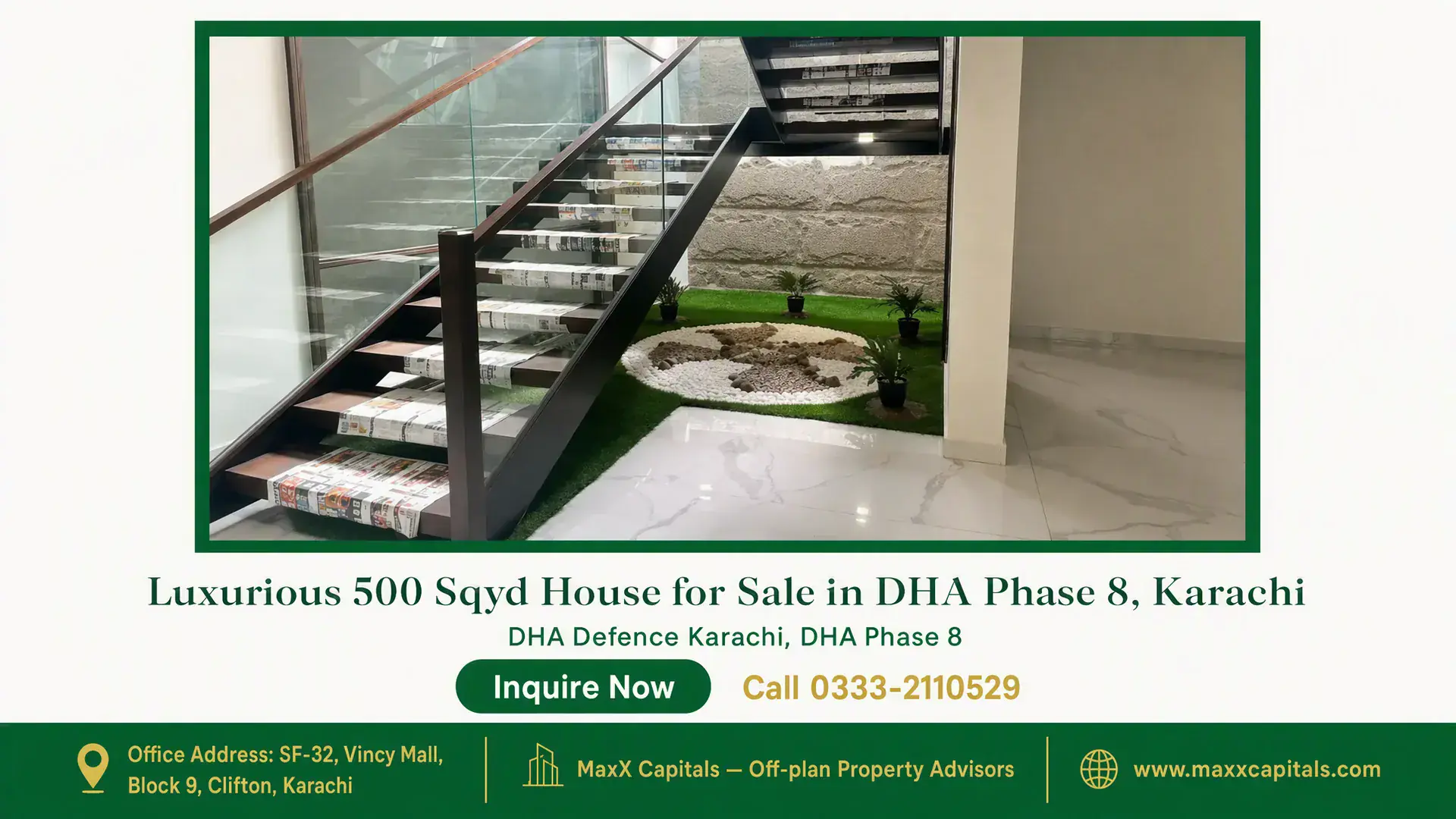 Luxurious 500 Sqyd House for Sale in DHA Phase 8, Karachi Modern floating staircase with glass balustrade, polished flooring, and indoor garden decor in a luxury house for sale.