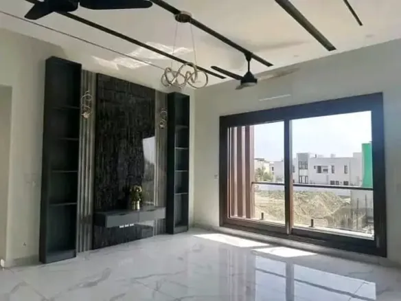 Spacious Living Room In Luxurious 500 Sqyd House For Sale, Dha Phase 8 Karachi, Modern Black Feature Wall, Built-In Cabinets,