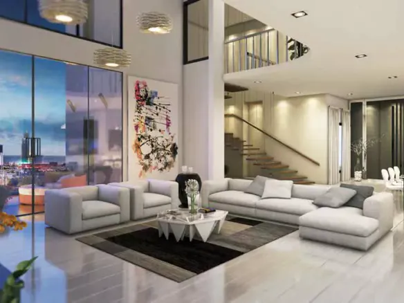 MaxX Capitals Bath Island Parsa Citi Club living room with double-height windows and modern staircase