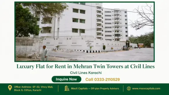 Gated entrance of Mehran Twin Towers with white facade and lush green surroundings in Civil Lines Karachi.