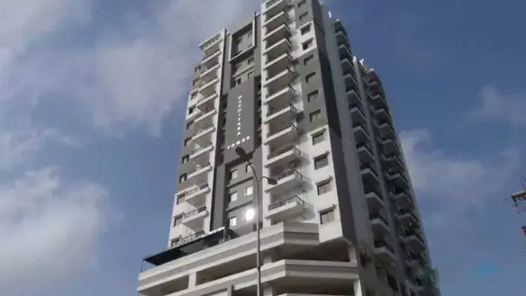 Machiyara Tower In Clifton, Tall Modern High-Rise With Multiple Balconies, Grey Facade And Large Windows