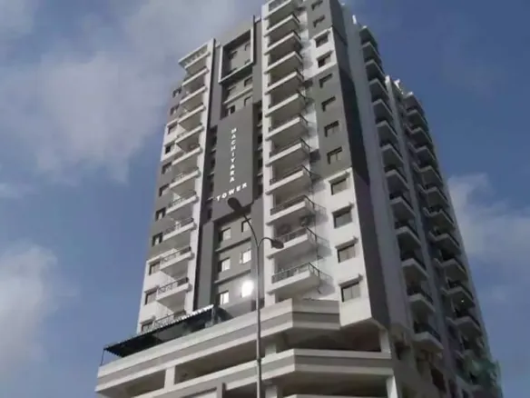 Machiyara Tower In Clifton, Tall Modern High-Rise With Multiple Balconies, Grey Facade And Large Windows