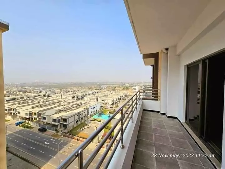 Luxurious 3 Bedroom Flat for Rent in Askari 5, Sector J Malir Cantonment Karachi (3) Spacious balcony in 3-bedroom flat for rent in Askari 5 Karachi with panoramic view of residential buildings, roads, pool and
