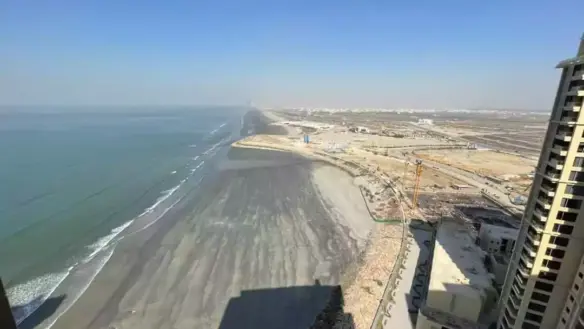 Expansive Sea-Facing View From Luxury Flat In Pearl Tower 3 Emaar, Showing Ocean, Beachfront, Construction, And High-Rises