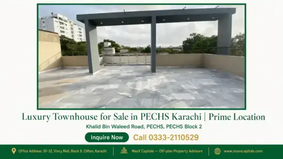 Spacious rooftop terrace with modern tile flooring and open views, located in a luxury townhouse for sale in PECHS Karachi.