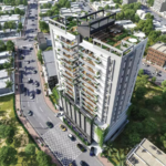 Aerial View Of Angel Home High-Rise In Bath Island Clifton, Modern White Facade With Green Balconies And Surrounding Roads