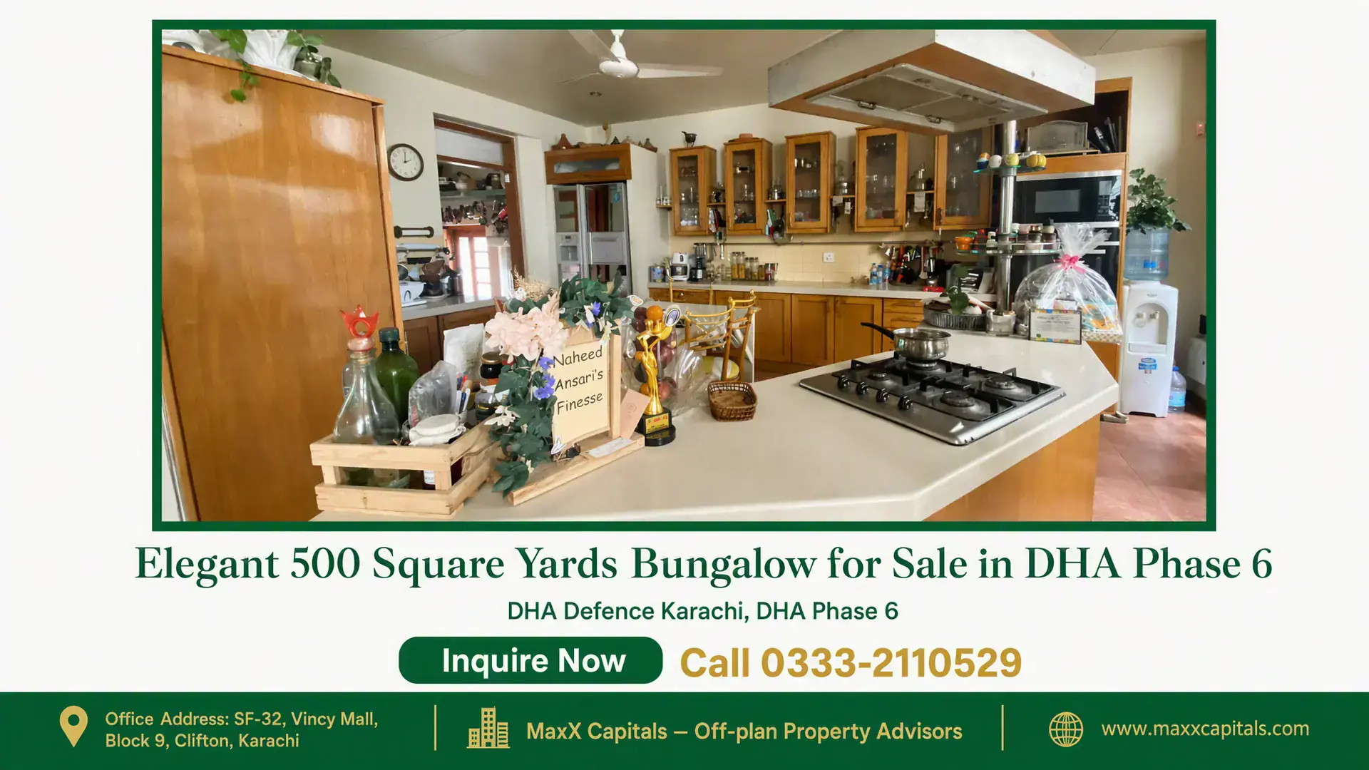 Elegant 500 Square Yards Bungalow for Sale in DHA Phase 6 Spacious kitchen in a 500 square yards bungalow featuring wooden cabinets, modern stove, and a stylish countertop in DHA Phas